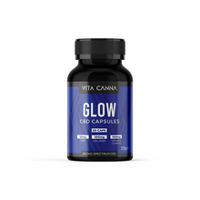 Load image into Gallery viewer, A black bottle labeled &quot;Vitacanna 500mg Broad Spectrum CBD Vegan Capsules - 50 Caps&quot; shows a blue label, contains 50 vegan capsules, and features broad spectrum CBD. Brand: Vitacanna.

