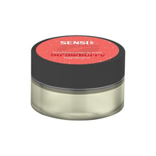 Load image into Gallery viewer, A small clear frosted jar with a black screw-on lid, containing Sensi Skin&#39;s 100mg CBD strawberry sugar lip scrub. The lid is red and features the product name and description in white text. This vegan-friendly jar embodies a simple, minimalistic design and holds 25g of the lip scrub for enhanced care. Don&#39;t miss out on the BUY 1 GET 1 FREE offer!
